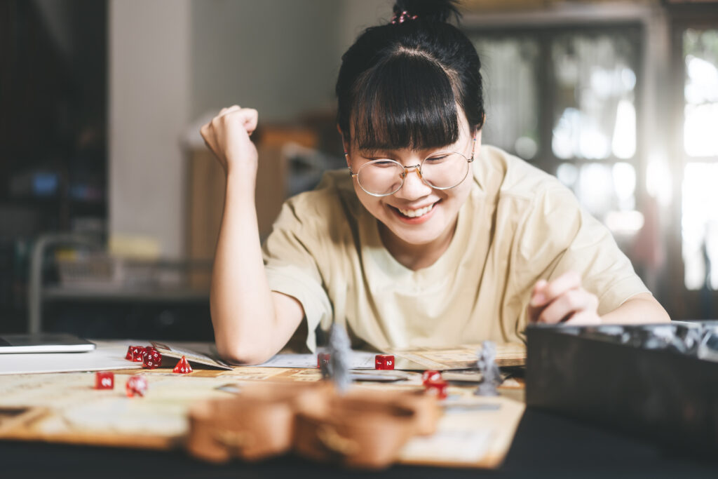 Teen girl playing in a D&D group therapy game